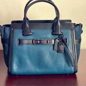 Original Coach woman’s handbag , model name : MX Swagger size 27